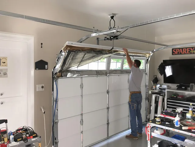 Garage door section replacement by Plymouth Garage Door Repair in Plymouth