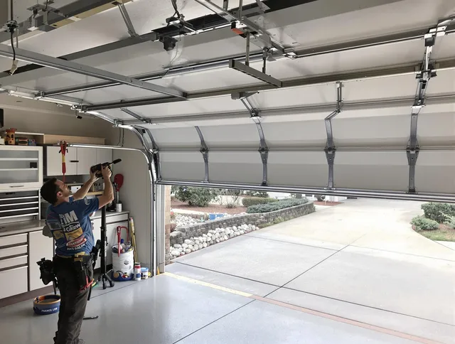 Garage door track repair service by Plymouth Garage Door Repair in Plymouth